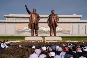 Mother faces jail for saving her children instead of Kim family portraits.