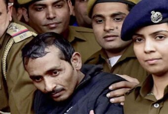 Akku Yadav surrounded by police